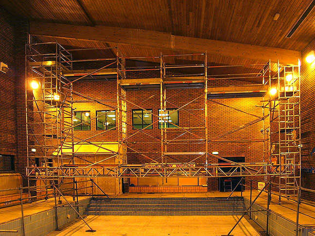 Staggered level system for redecorating a sloping ceiling above a swimming pool in Birmingham by Harwood Access and Training Solutions